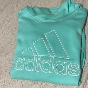 Woman’s large pullover Adidas sweater